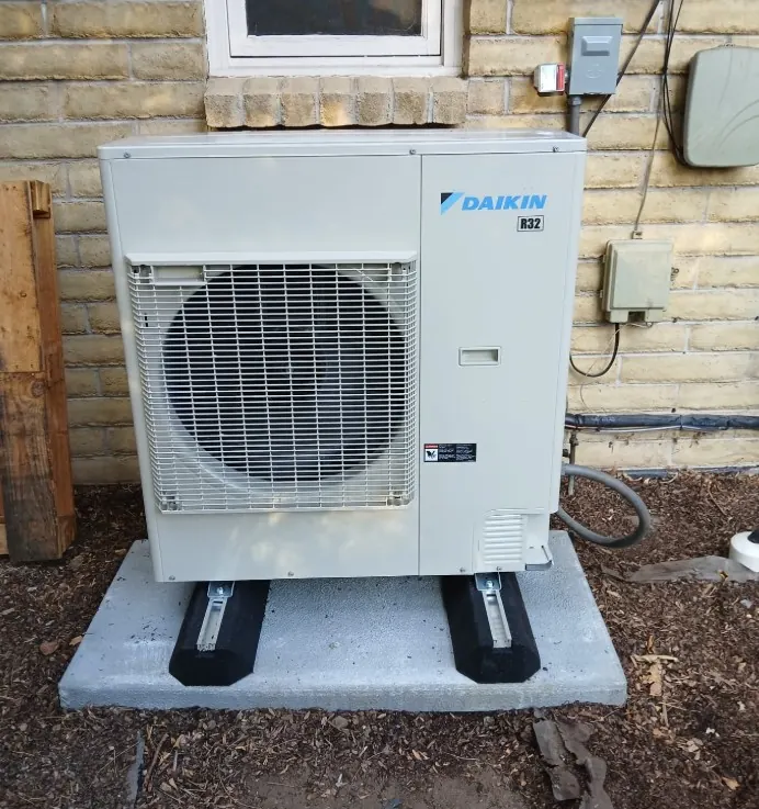 Daikin cold climate heat pump installed outside a Golden, Colorado home